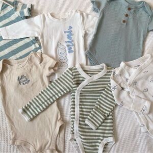 Assortment of earthy, textured onesies